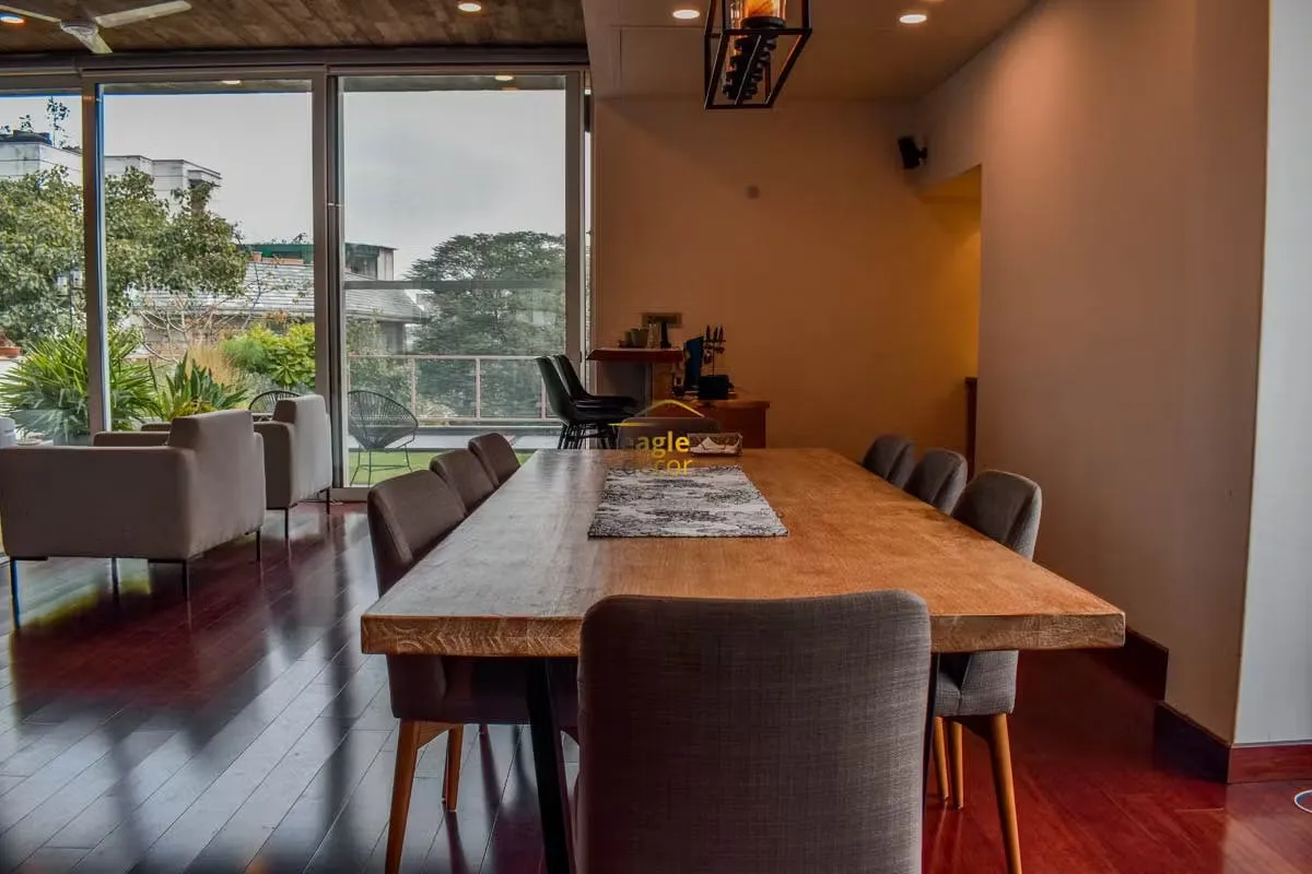 Layered villa seating arrangement with textured finishes and curated styling
