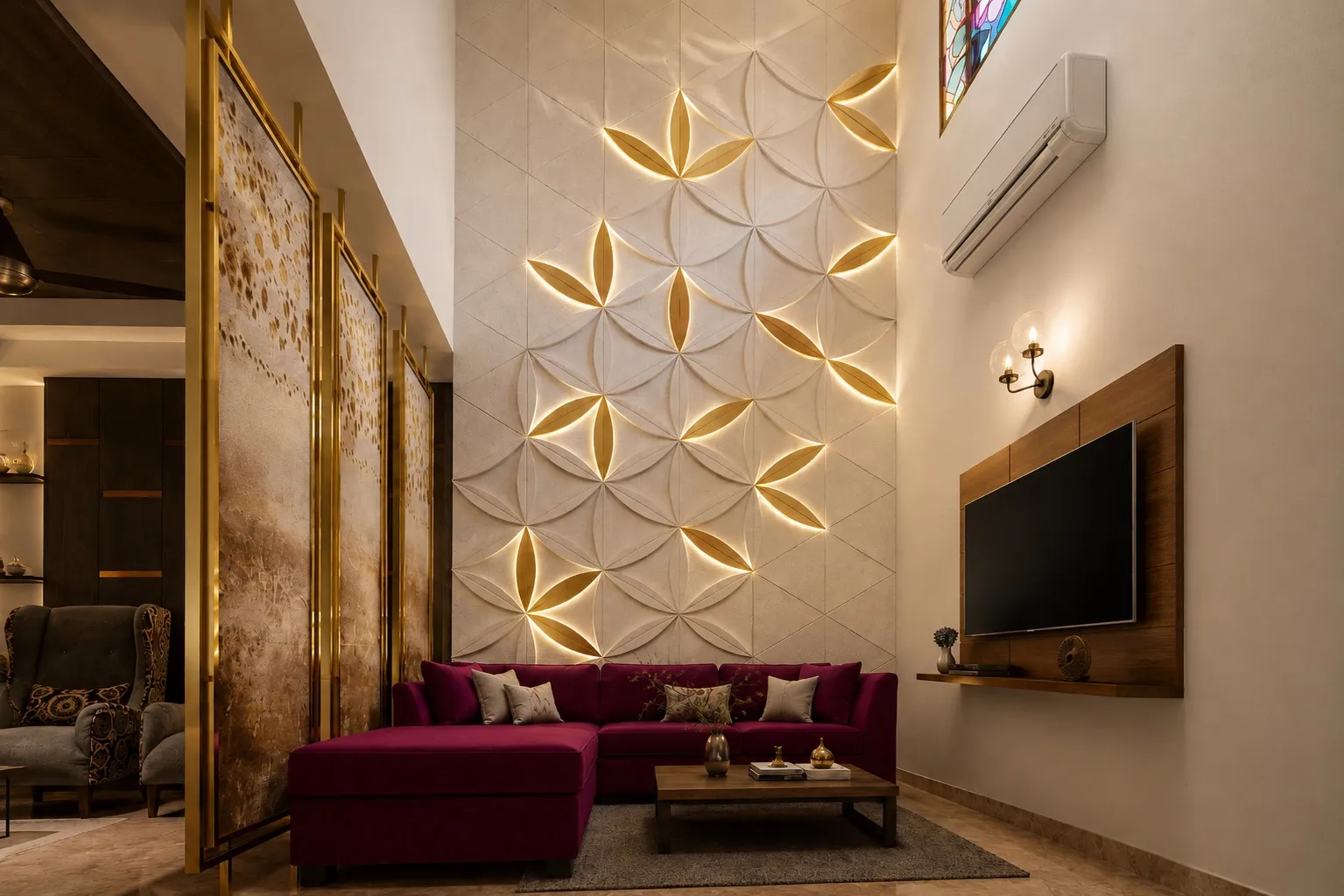 Double-height living room with a backlit hand-carved flower-of-life stone feature wall, a magenta sectional sofa, and a brass screen partition