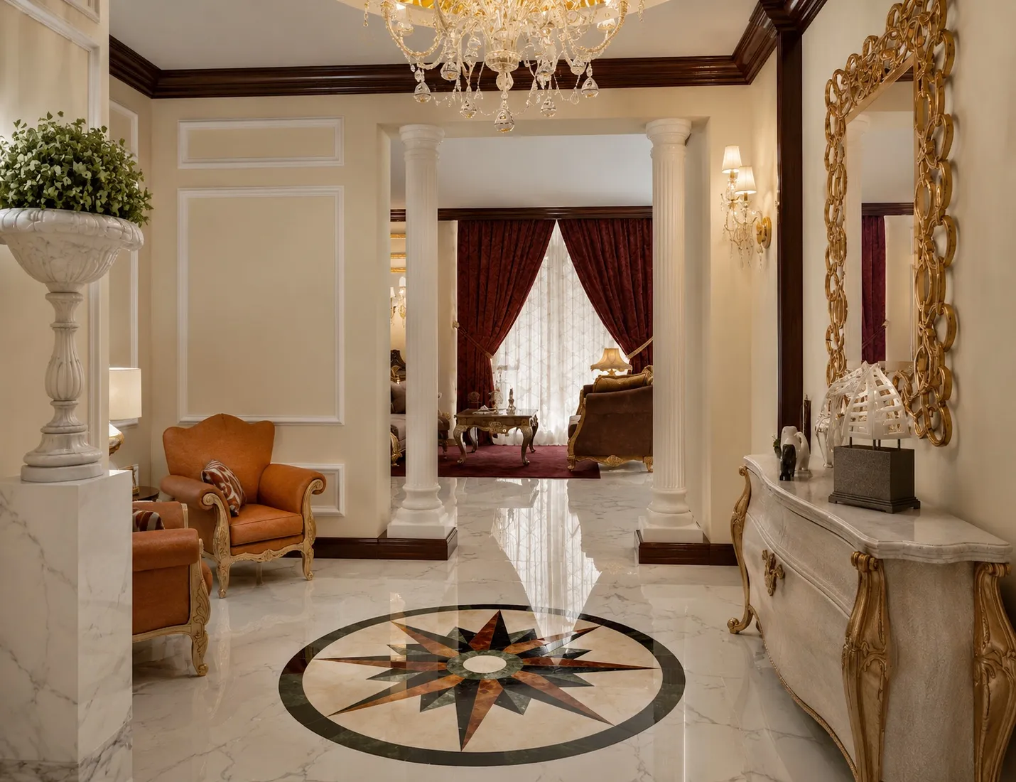 Villa entrance foyer with a compass-star marble floor inlay, fluted white columns, a gold ornate mirror, and a marble console