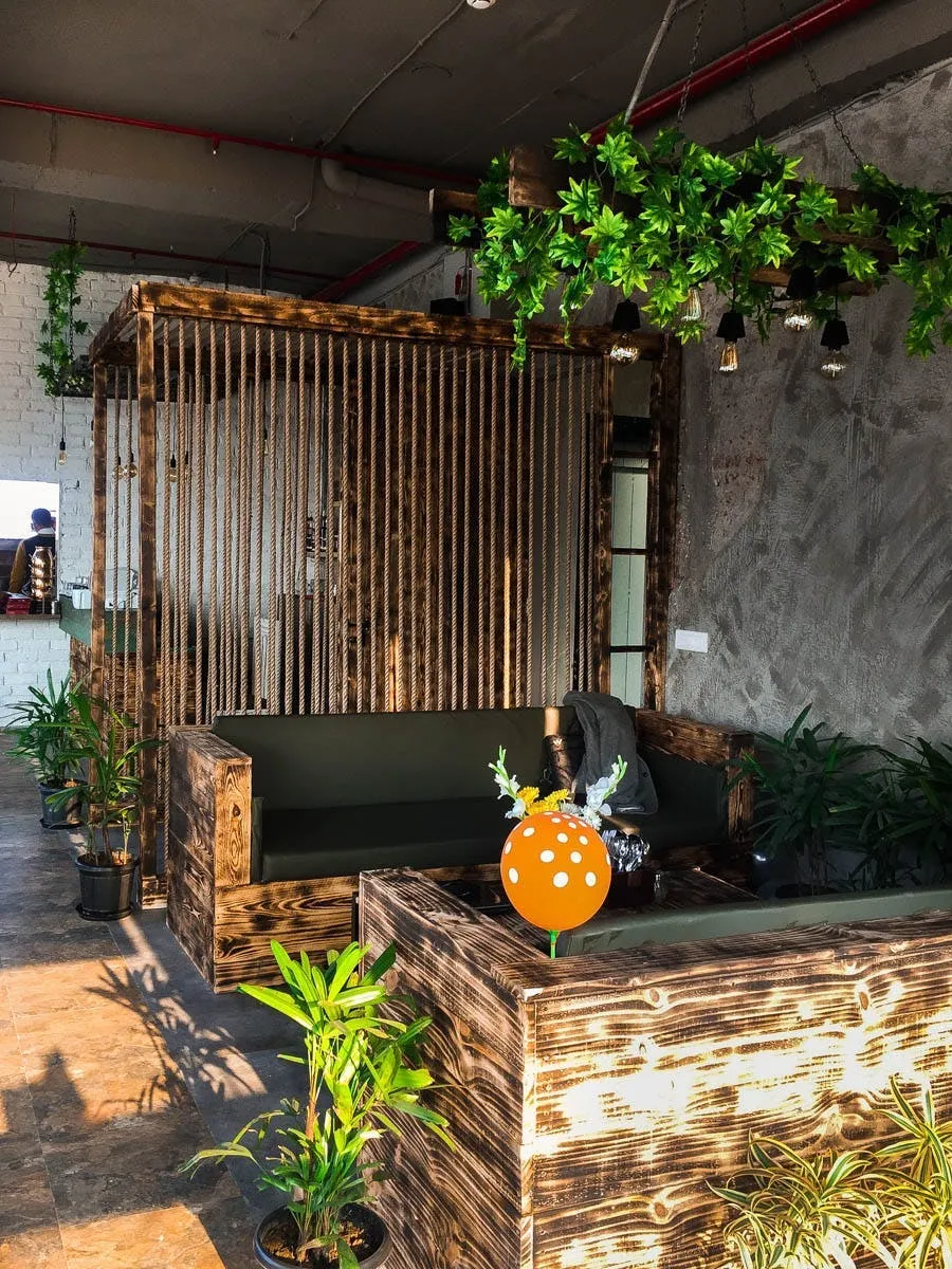 Restaurant seating area with custom finishes and ambient lighting