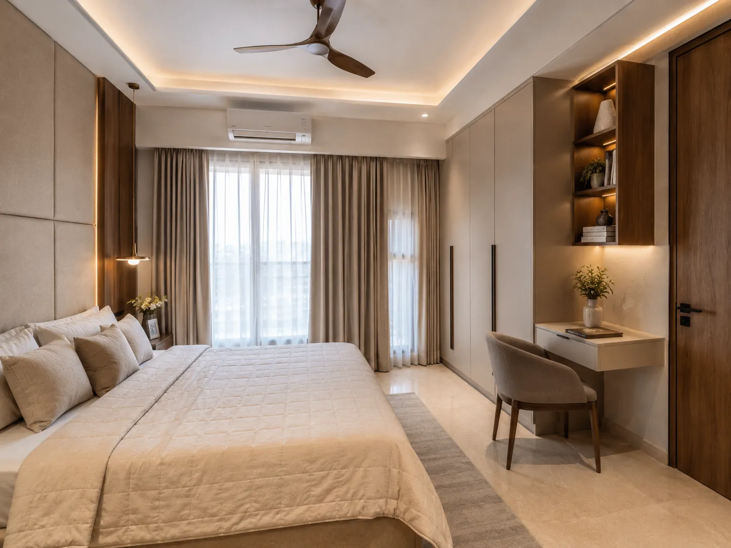 Neutral bedroom design featuring a beige upholstered headboard, floor-to-ceiling wardrobes, a floating study desk, and open wood shelving with LED strip lights.